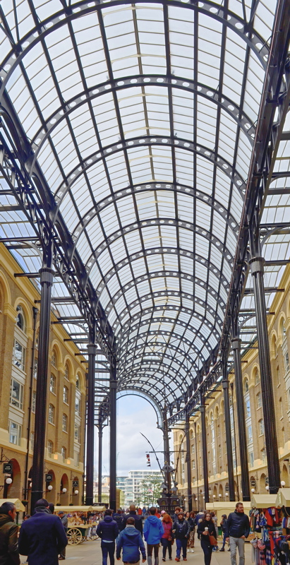 24 - The interior barrel-vaulted glass and iron roof of Hay's Galleria located on the South Bank of the River Thames in London, England